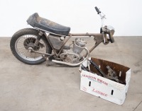 A circa late 1960s BSA, possibly B20 or B25, numbers not visible, with box of assorted parts believed to accompany frame [SALEROOM NOTICE]