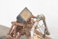 A small light weight motorcycle made up of BSA fittings and frame, has complete front end, features girder forks, possibly Triumph [Updated Description] - 2