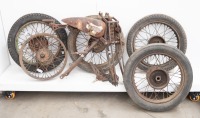 A group of BSA Sloper parts including front frame with tank and five wheels