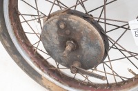 A 1950s 19" British front wheel, possibly BSA/Triumph, turns, with hub and brake plate - 2