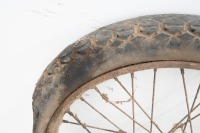 A early vintage wheel with 4" brake drum, complete with axle and bearings, may suit small 2-stroke from 1920s/1930s - 3