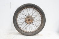 A circa 1940s 19" front wheel, likely BSA C10, 5" brake drum with hub, turns