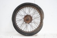 A 19" rear wheel, with axle, turns
