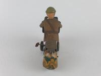 MILITARY: Military Motorcycle by Mettoy UK with flint gun, camouflaged, 19 cms, c1940s with later replacement head - 6