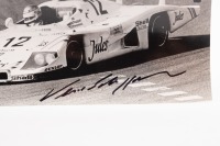 PORSCHE 936/81 VERN SCHUPPAN: A signed black and white photo, showing Vern Schuppan in action at the 1981 Le Mans 24 hour race, this car finished in 12th place, co drivers Mass - Haywood - 2