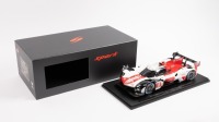TOYOTA GR010 HYBRID: A 1:18 scale Toyota GR010 hybrid, the number #8 race car as raced to victory by Toyota Gazoo racing in the 2022 Le Mans 24 hour, with a driver combination of Buemi - Hirakawa - Hartley