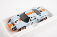 FORD GT40: A 1:18 scale Ford GT40, in the famous Gulf racing colours, the number #6 race car, as driven to victory in the 1969 Le Mans 24 hour, with a driver combination of Jacky Ickx - Jackie Oliver - 2