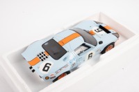 FORD GT40: A 1:18 scale Ford GT40, in the famous Gulf racing colours, the number #6 race car, as driven to victory in the 1969 Le Mans 24 hour, with a driver combination of Jacky Ickx - Jackie Oliver - 3