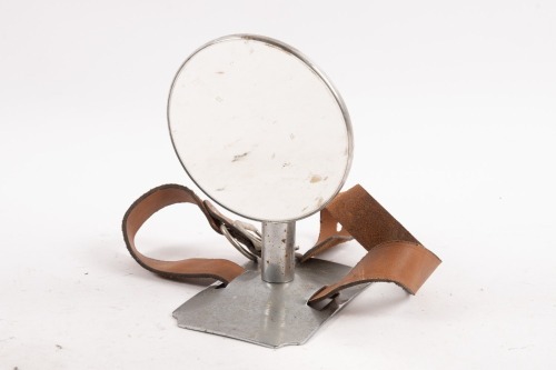 SIDE MIRROR: A small rear view mirror with leather strap to fix on side spare wheel [Location: Melbourne]
