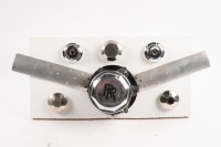 ROLLS-ROYCE: A Rolls-Royce display board, contains five nickel plated radiator caps, a wheel cap & a turbine with two fan blades, 24cm high, 48cm wide [Location: Melbourne]