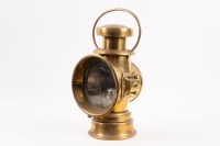 LUCAS: A Lucas brass Petroleum Motor-Lamp, overall height 29cm, lens diameter 10cm [Location: Melbourne]