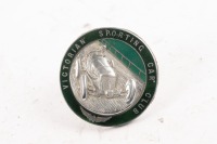 V.S.C.C: A 'VICTORIAN SPORTING CAR CLUB' car badge by Stokes of Melbourne, nickel chromium with enamel front depicting vintage racing car on green background [Location: Melbourne]