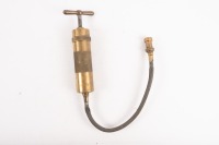 ENOTS: A circa 1920s Enots, made in England, brass flexible grease gun, 22.5cm long [Location: Melbourne]