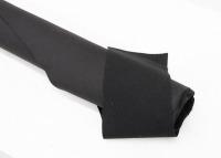 FABRIC: A large bolt of black fabric, believed to be used for tonneau covers, bolt approximately 155cm long [Location: Melbourne] - 2