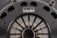 FLYWHEEL: A Competition Clutch flywheel, number on trans disc 'TM2-870-4', unknown if complete, 35.5cm wide [Location: Melbourne] - 2