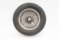 WIRE WHEEL: A wire wheel with Dunlop tyre, size 14 inch [Location: Melbourne]
