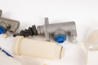 MASTER CYLINDERS: Three AP Racing master cylinders and a group of assorted AP Racing reservoirs and NOS hardware sets [Location: Melbourne] - 3