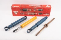 KONI: A Koni shock absorber [P/N 8611 1257SPORT] plus also two made in England shock absorbers, manufacturer unknown [P/N 501445] [Location: Melbourne]