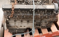 JAGUAR: A circa 1970s Jaguar V-12 engine, with distributor cap, sump & flywheel, stamped '7P5078SB" [Location: Melbourne] - 2