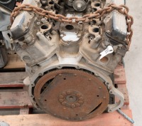 JAGUAR: A circa 1970s Jaguar V-12 engine, with distributor cap, sump & flywheel, stamped '7P5078SB" [Location: Melbourne] - 3
