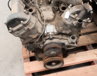 JAGUAR: A circa 1970s Jaguar V-12 engine, with distributor cap, sump & flywheel, stamped '7P5078SB" [Location: Melbourne] - 4