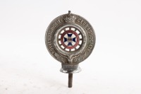RACQ: An early Royal Automobile Club of Queensland 'Associate' pedestal mounted badge with enameled centre, numbered to lower 'A6626' manufactured by Wallace Bishop, 14cm high overall [Location: Melbourne]