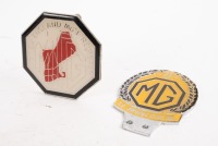 MG: Two MG related badges, includes an MG T.C. Owners Club Inc. 25th anniversary 1961-1986 badge and a MG The New England MG 'T' Register badge [Location: Melbourne]