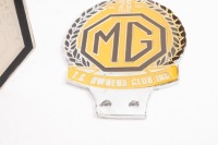 MG: Two MG related badges, includes an MG T.C. Owners Club Inc. 25th anniversary 1961-1986 badge and a MG The New England MG 'T' Register badge [Location: Melbourne] - 2