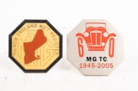 MG: Two MG related car badges, includes an MG TC 60th anniversary 1945-2005 badge and a MG The New England MG 'T' Register badge [Location: Melbourne]