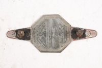 MG: An early rare MG Car Club grille badge, red with horizontal ribs, 6.5cm high, 16cm wide [Location: Melbourne] - 2
