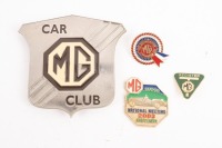 MG: Four MG related badges, includes an MG Car Club badge, a small rosette badge, a small triangular MG Register badge and an MG 2003 National Meeting Shepparton badge [Location: Melbourne]