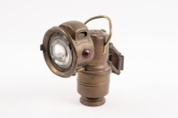 MOTORCYCLE LAMP: An early brass motorcycle kerosene headlamp made by Powell & Hanmer Birmingham, 18cm high [Location: Melbourne]