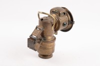 MOTORCYCLE LAMP: An early brass motorcycle kerosene headlamp made by Powell & Hanmer Birmingham, 18cm high [Location: Melbourne] - 2