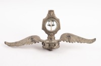 HOOD ORNAMENT: An early winged radiator cap hood ornament with attached motometer, 33cm wide, 15cm high [Location: Melbourne]