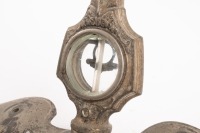 HOOD ORNAMENT: An early winged radiator cap hood ornament with attached motometer, 33cm wide, 15cm high [Location: Melbourne] - 2