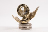 BOYCE MOTOMETER: A reproduced winged radiator cap with attached Boyce Motometer, 12cm high, 12cm wide [Location: Melbourne] - 2