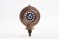 R.A.C.V: An early Royal Automobile Club of Victoria (RACV) member's hood ornament badge by Angus & Coote Ltd Sydney, member number '7158' engraved to base, 10cm wide, 16cm high overall [Location: Melbourne] - 2