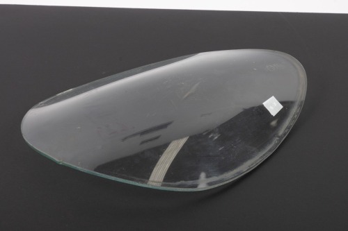 JAGUAR: A Jaguar E-Type right side headlight glass lens [Location: Melbourne]