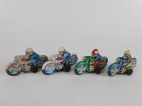 POLICE: Four small friction motorcycles, includes two Police, 9.5cms each c1970s, colourful.
