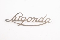 LAGONDA: A Lagonda cars script badge, 12cm long, two mounting pins [Location: Melbourne]