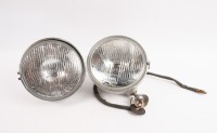 HEADLAMPS: A pair of early headlamps, with Hella H4 glass lens, lens diameter 17cm, [Location: Melbourne]