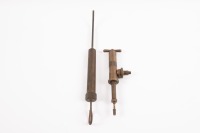 GREASE GUNS: Two early brass grease guns, one made by Enots (21.5cm long) and other manufacturer unknown (39cm long), [Location: Melbourne]