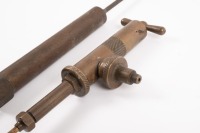 GREASE GUNS: Two early brass grease guns, one made by Enots (21.5cm long) and other manufacturer unknown (39cm long), [Location: Melbourne] - 2