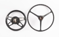 STEERING WHEELS: Two steering wheels, one thought to suit a tractor, 43.5cm wide and one thought to suit a racing car, 34cm wide [Location: Melbourne] - 2