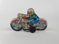 POLICE: Four small friction motorcycles, includes two Police, 9.5cms each c1970s, colourful. - 12