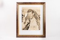 BIB STILLWELL: An impressive larger period photograph of Bib Stillwell on podium with laurel taken by Ray Simpson, image 38cm high x 30cm wide (Driving a Cooper-Climax)