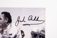 JACK BRABHAM: A b/w photograph featuring Sir Jack conversing in pits, hand signed by Sir Jack in black marker, mounted, framed and glazed, image 24.5cm high, 19.5cm wide - 2