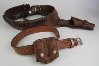 FIREARMS: Three brown leather belts, one with holster