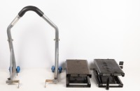ENGINE LIFTS / BIKE STAND: Two motorbike engine or gearbox scissor lifts and one rear stand