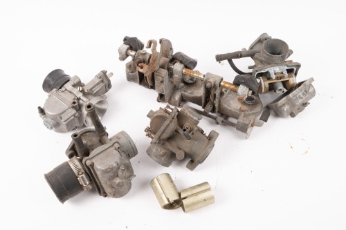 CARBURETTOR PARTS: A box of assorted carburettor parts